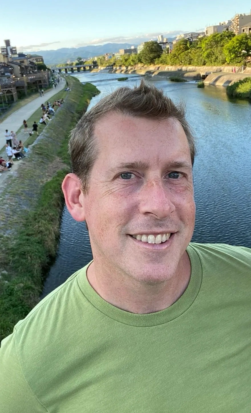 Me visiting Kyoto, Japan along the Kamogawa river in 2024